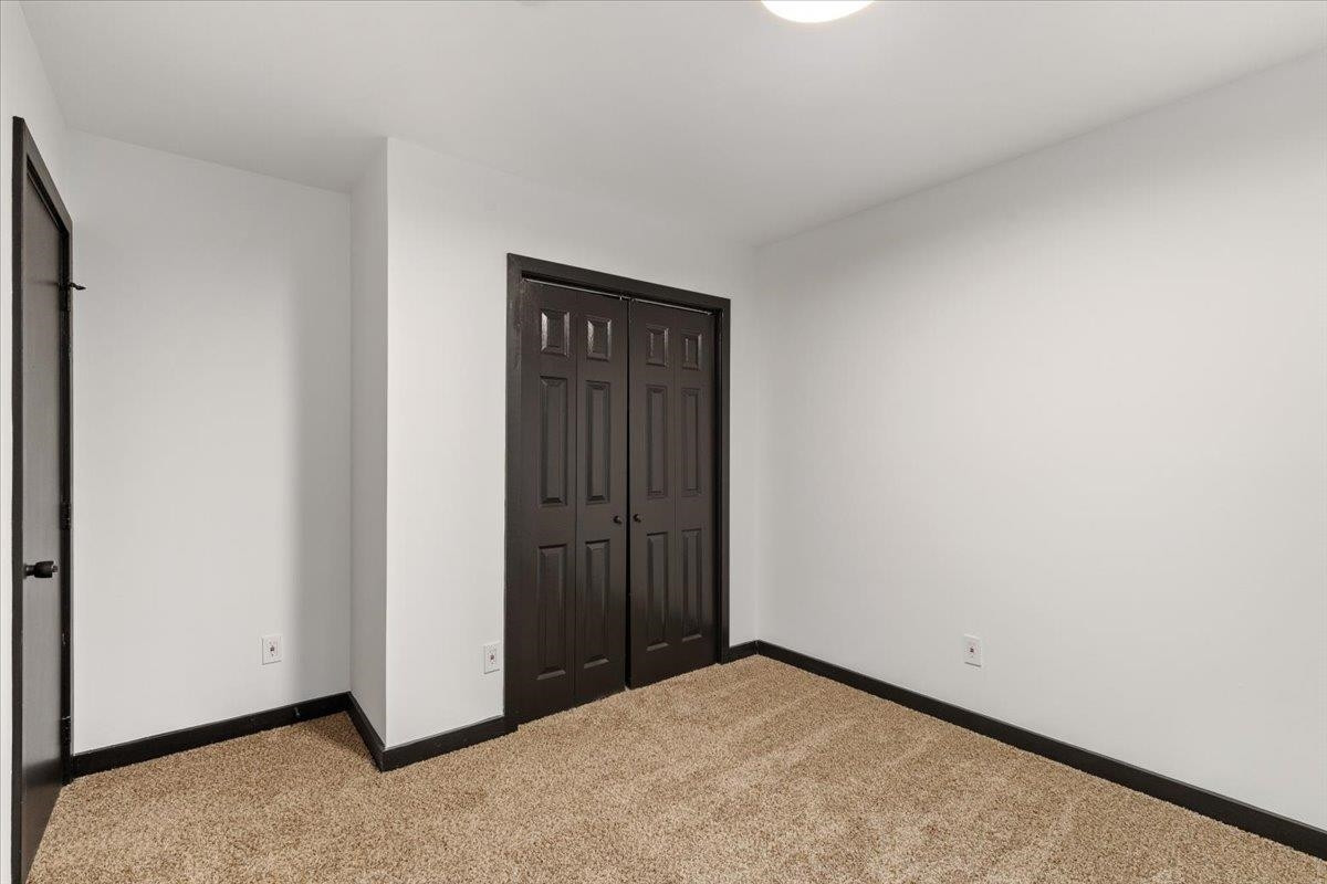 5433 Penrith Drive Durham, NC 27713 - Photo 14 of 47 a view of an empty room