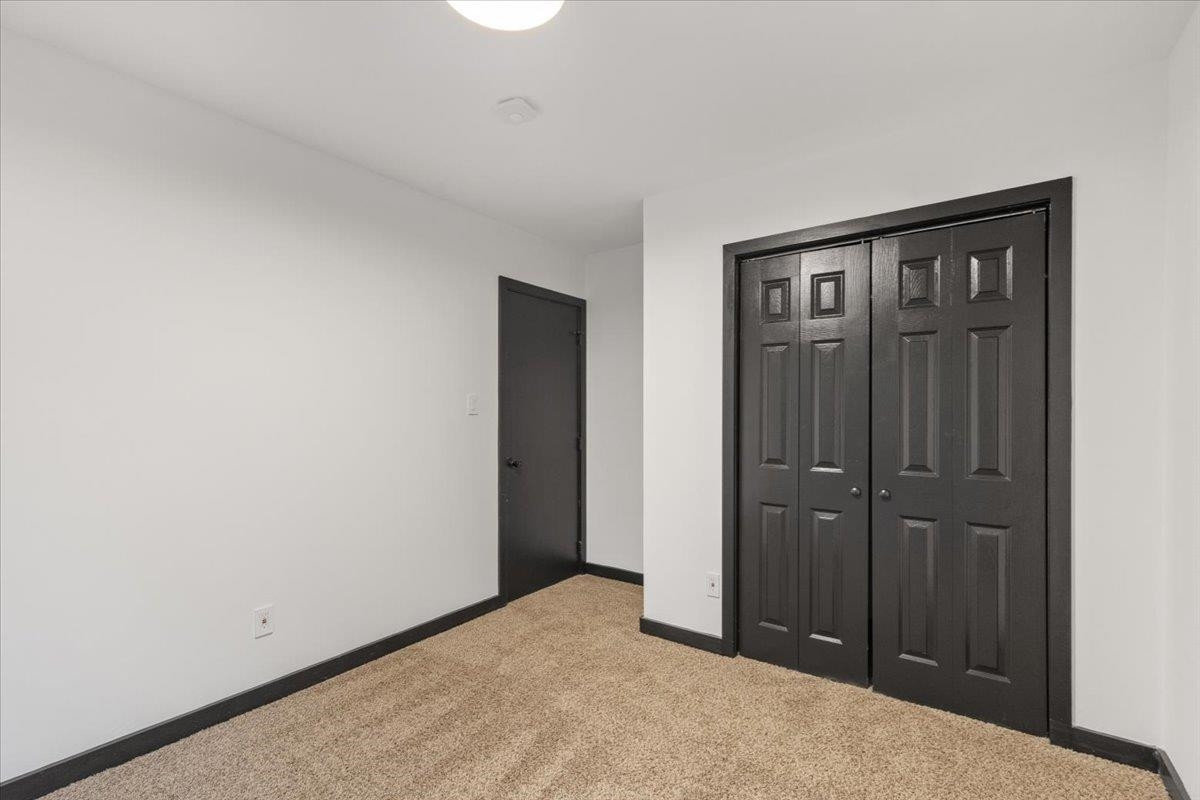 5433 Penrith Drive Durham, NC 27713 - Photo 15 of 47 a view of an empty room