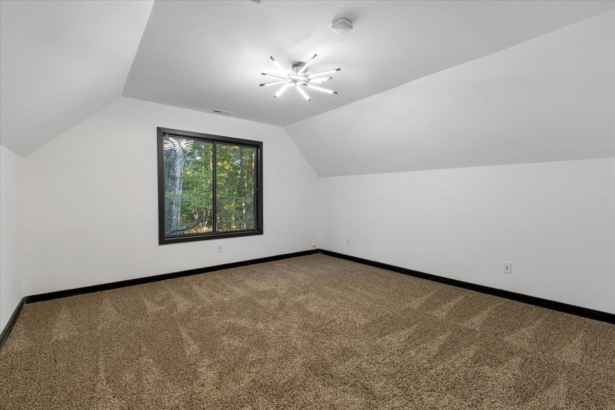 5433 Penrith Drive Durham, NC 27713 - Photo 27 of 47 an empty room with a window