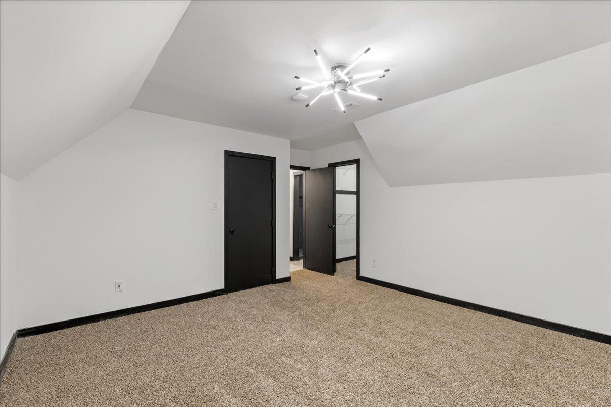 5433 Penrith Drive Durham, NC 27713 - Photo 29 of 47 a view of a chandelier fan and entryway