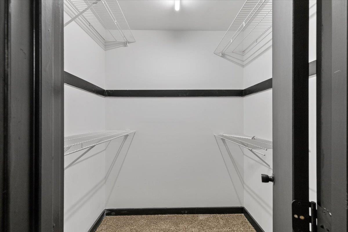 5433 Penrith Drive Durham, NC 27713 - Photo 31 of 47 a view of walk in closet