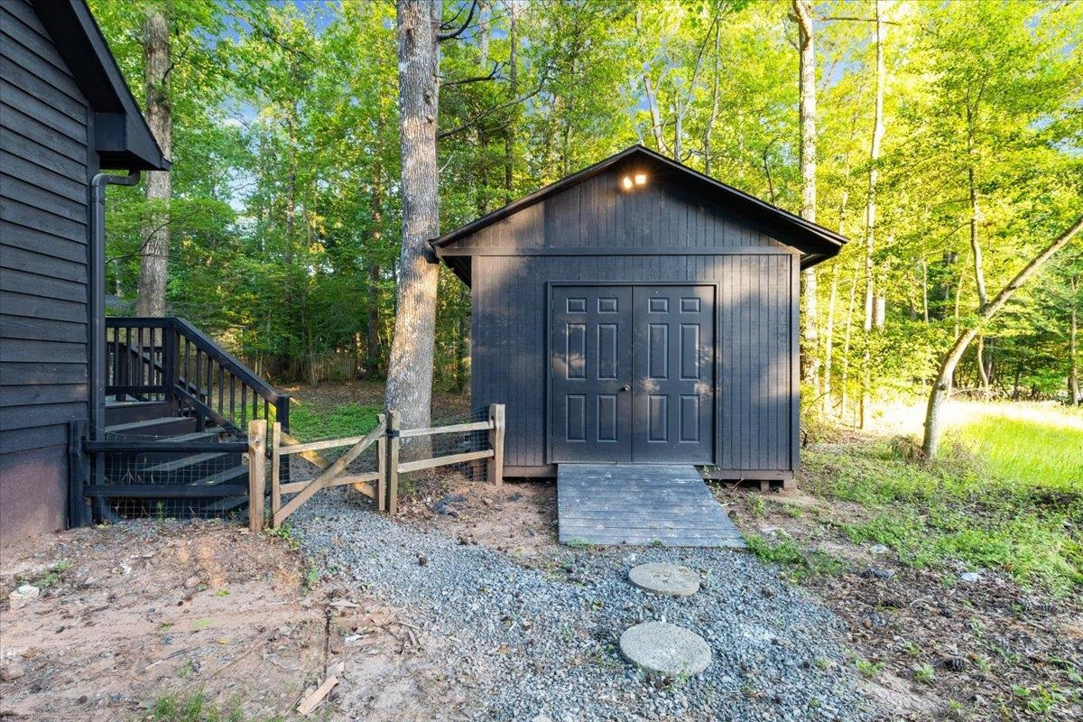 5433 Penrith Drive Durham, NC 27713 - Photo 35 of 47 a view of a house with a yard