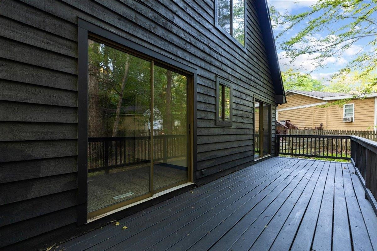 5433 Penrith Drive Durham, NC 27713 - Photo 37 of 47 a view of a balcony with wooden floor