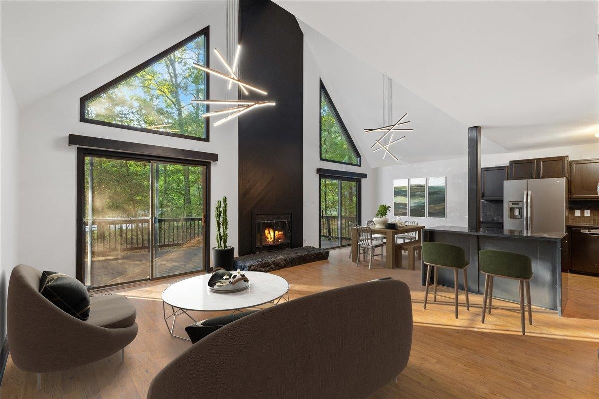 5433 Penrith Drive Durham, NC 27713 - Photo 4 of 47 a living room with furniture and a large window