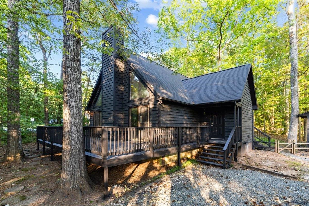 5433 Penrith Drive Durham, NC 27713 - Photo 43 of 47 a view of an outdoor sitting area with brick wall