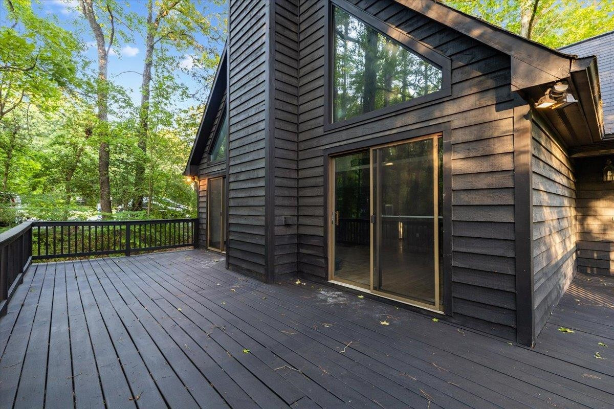 5433 Penrith Drive Durham, NC 27713 - Photo 44 of 47 a view of a house with a deck