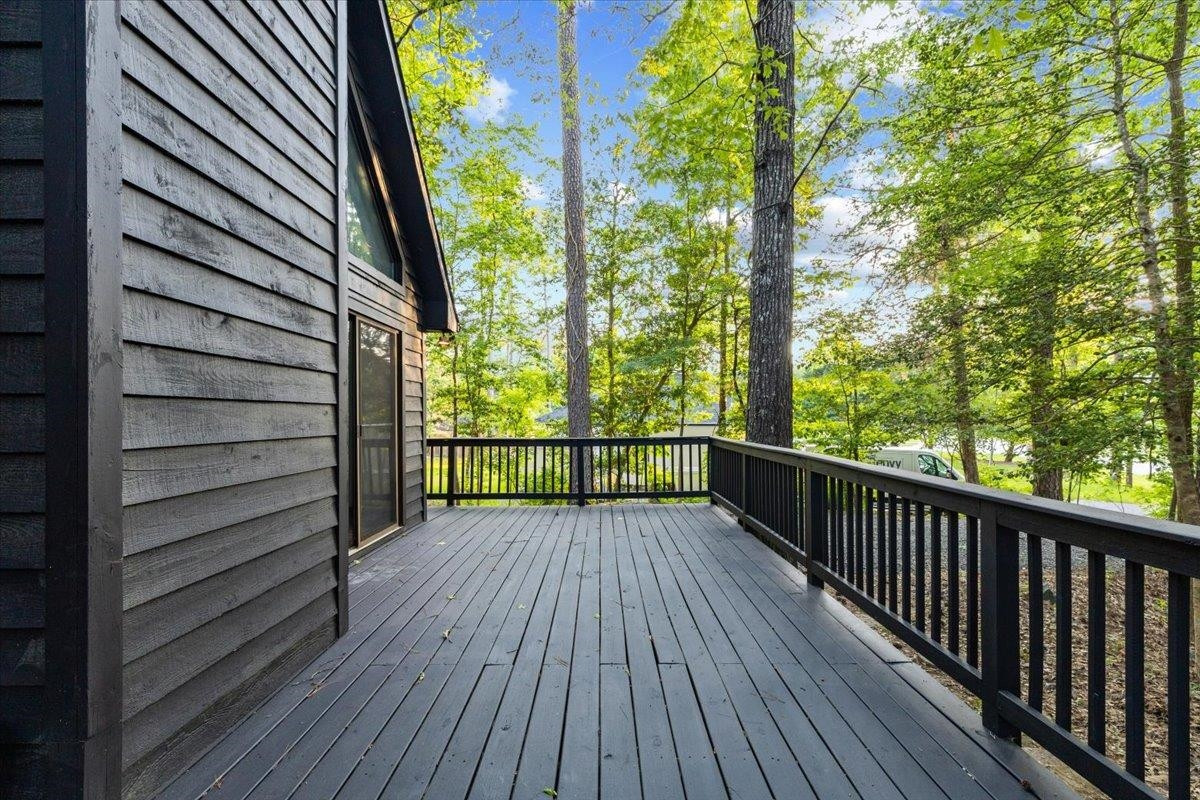 5433 Penrith Drive Durham, NC 27713 - Photo 45 of 47 a view of balcony with wooden floor