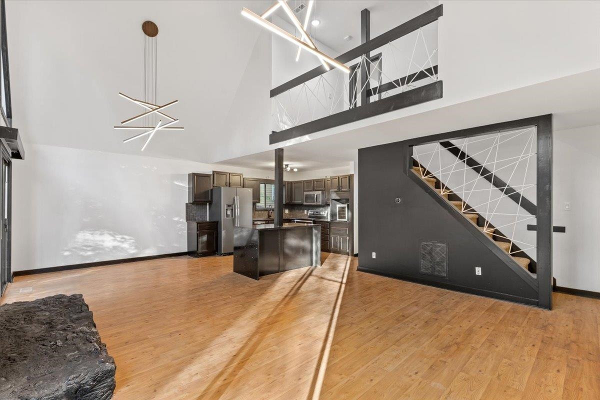 5433 Penrith Drive Durham, NC 27713 - Photo 6 of 47 a view of a living room and entryway