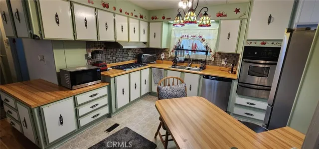 a very nice looking dining room with a table and chairs