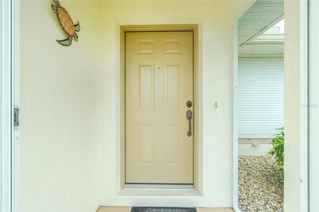 a view of a bathroom from a corridor