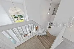an aerial view of a house with outdoor space