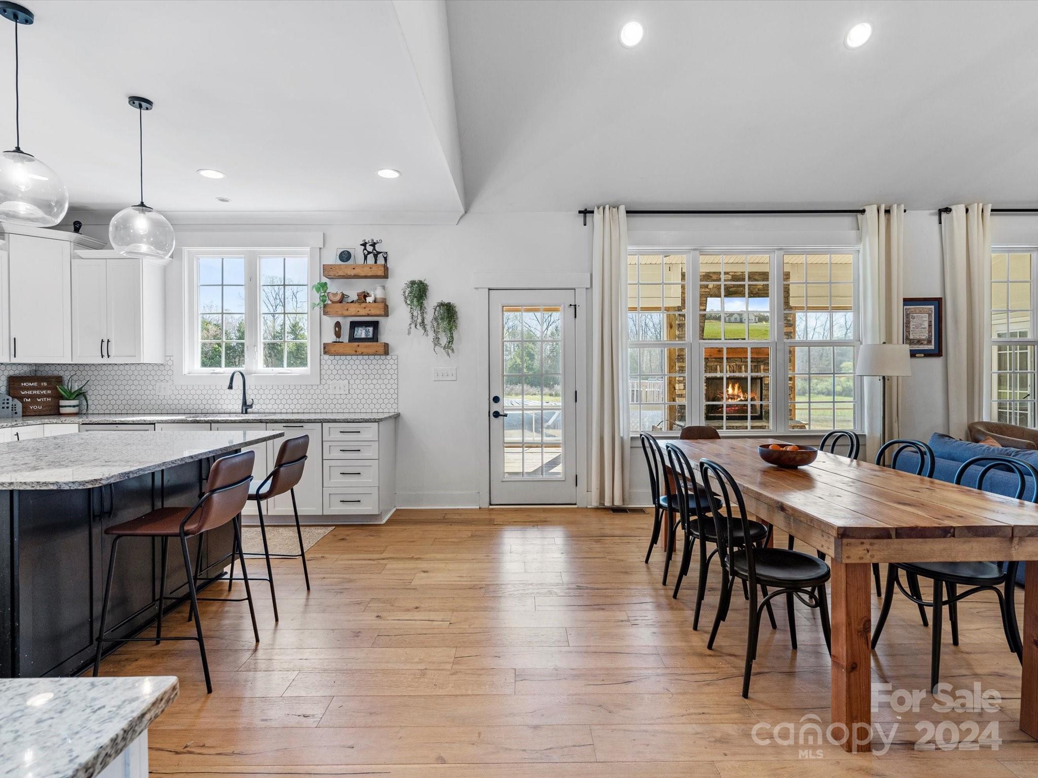 4078 Booney Road Rock Hill, SC 29730 - Photo 11 of 41 a view of a a dining room with furniture window and wooden floor