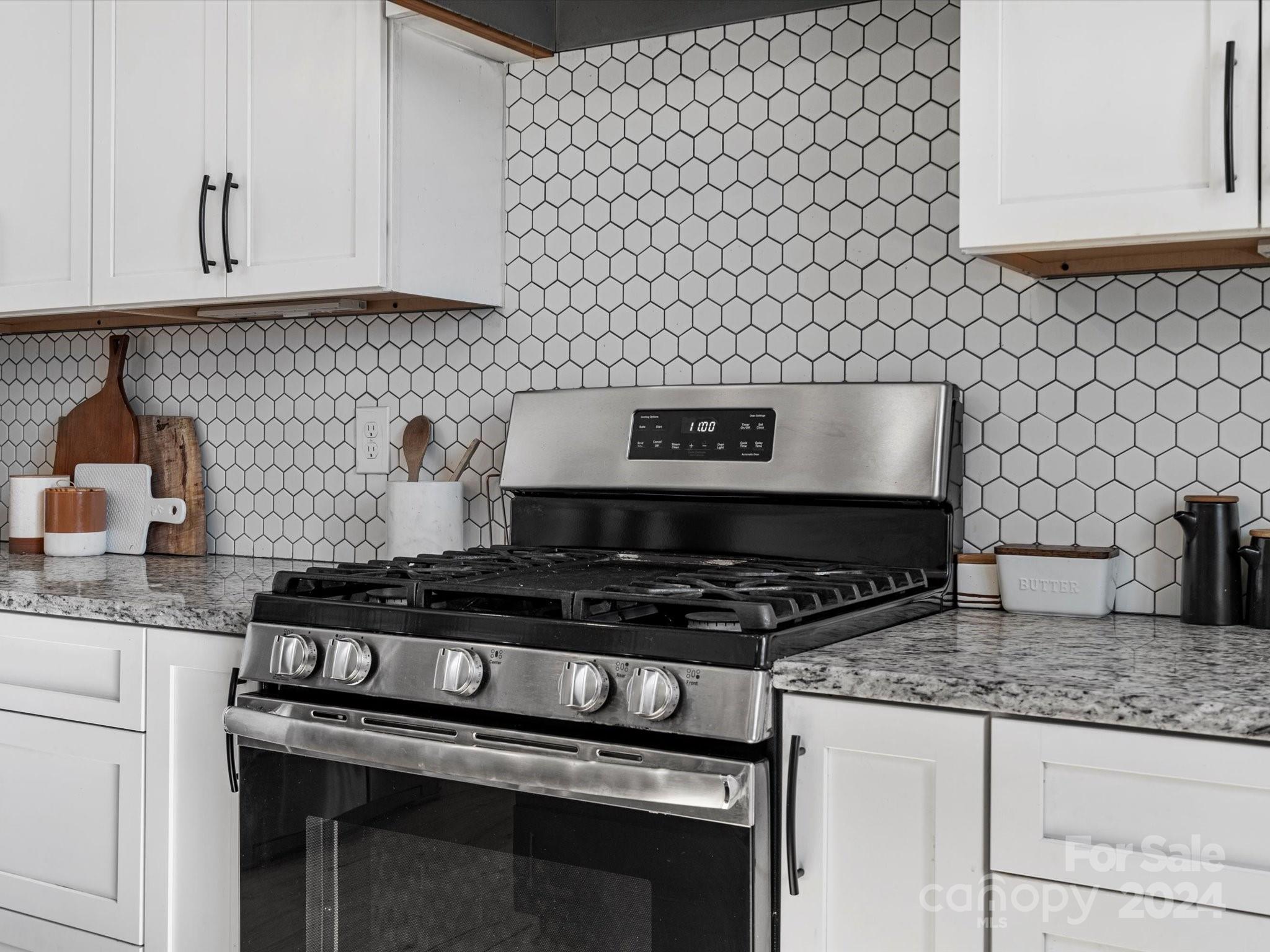 4078 Booney Road Rock Hill, SC 29730 - Photo 15 of 41 a stove top oven sitting inside of a kitchen