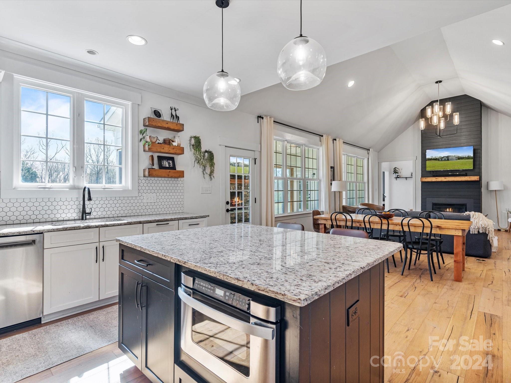 4078 Booney Road Rock Hill, SC 29730 - Photo 17 of 41 a kitchen with center island table and chairs in it