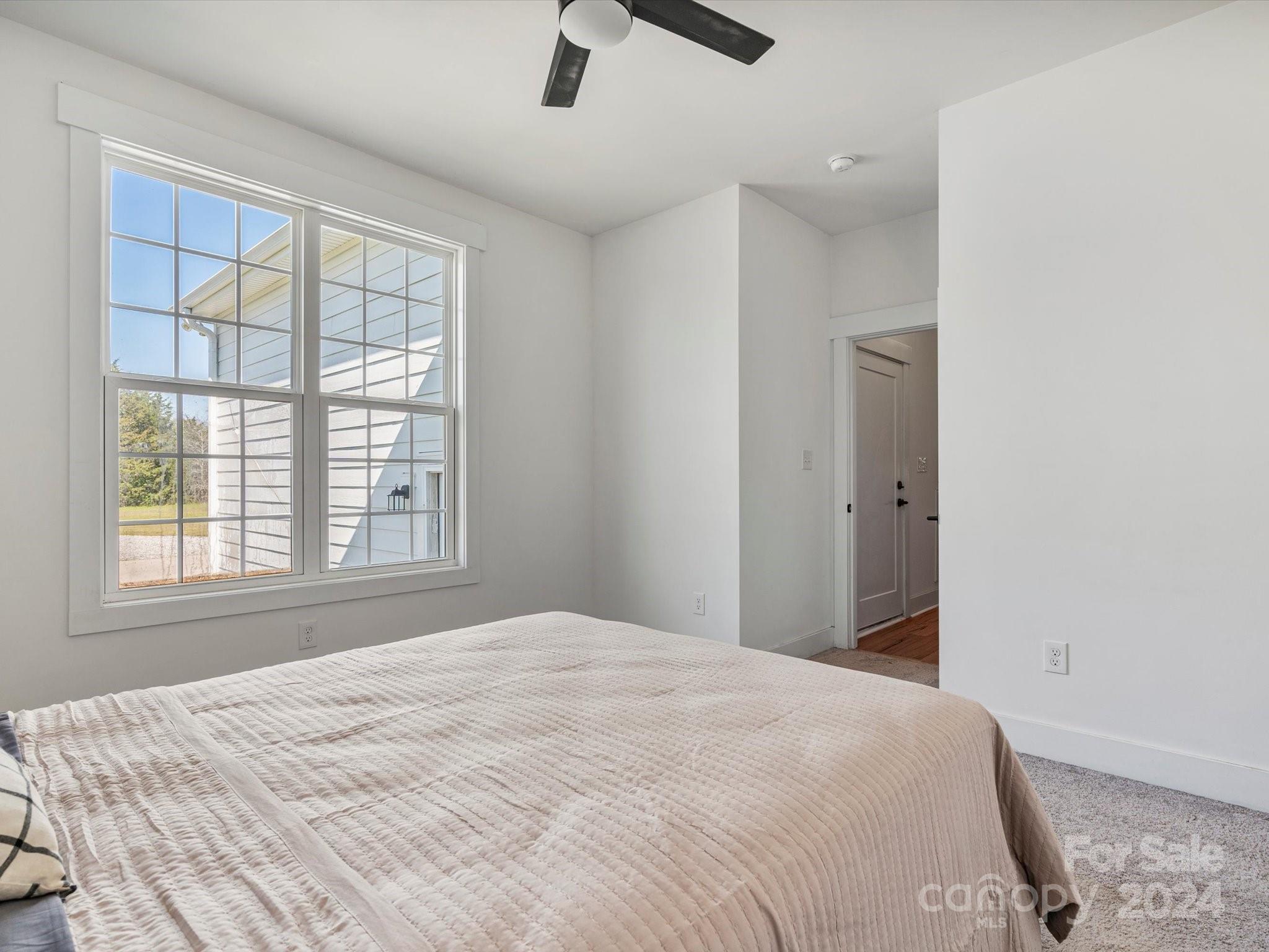 4078 Booney Road Rock Hill, SC 29730 - Photo 28 of 41 a bedroom with a bed and a window