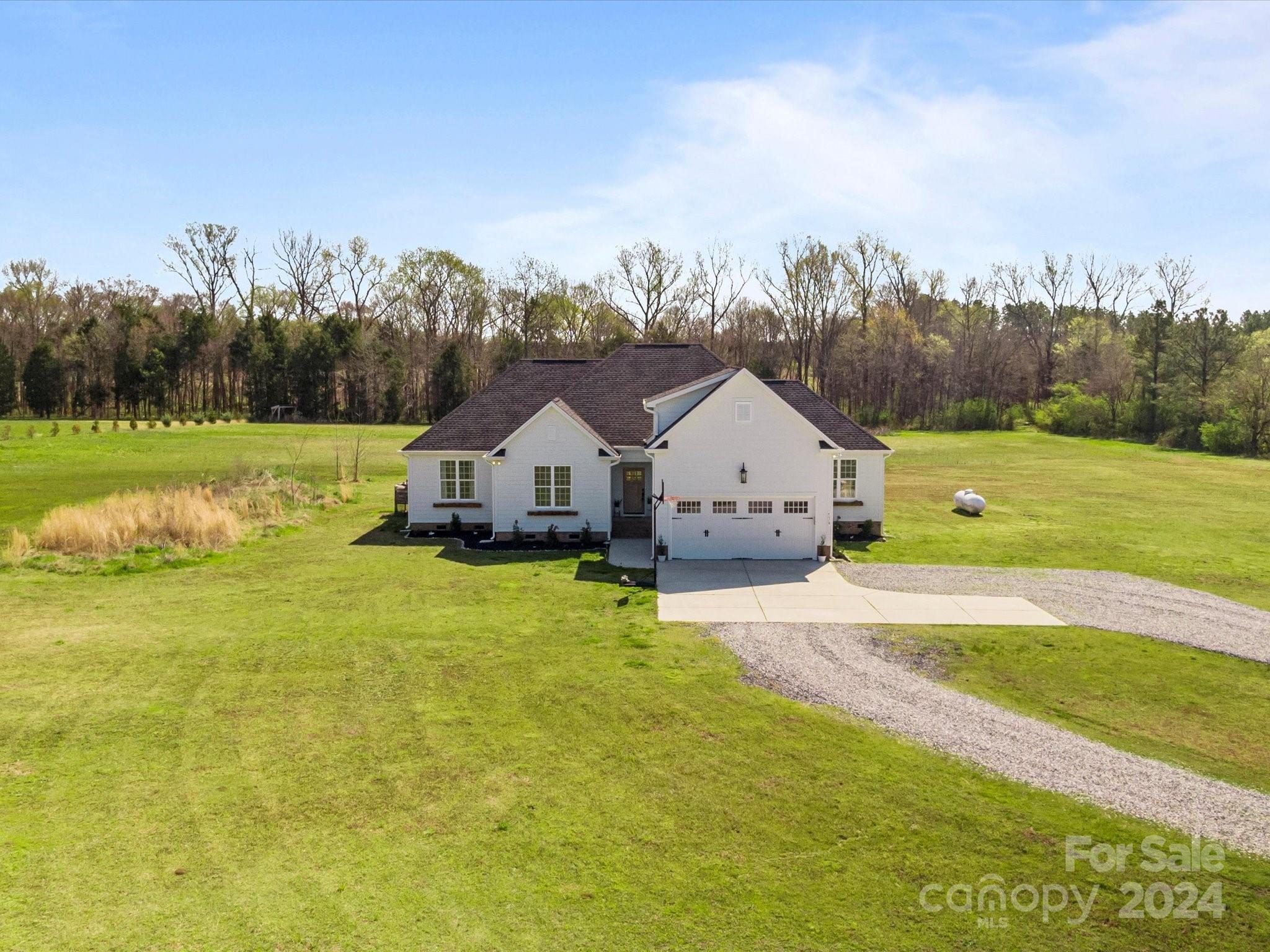 4078 Booney Road Rock Hill, SC 29730 - Photo 4 of 41 a front view of a house with a yard and countertop
