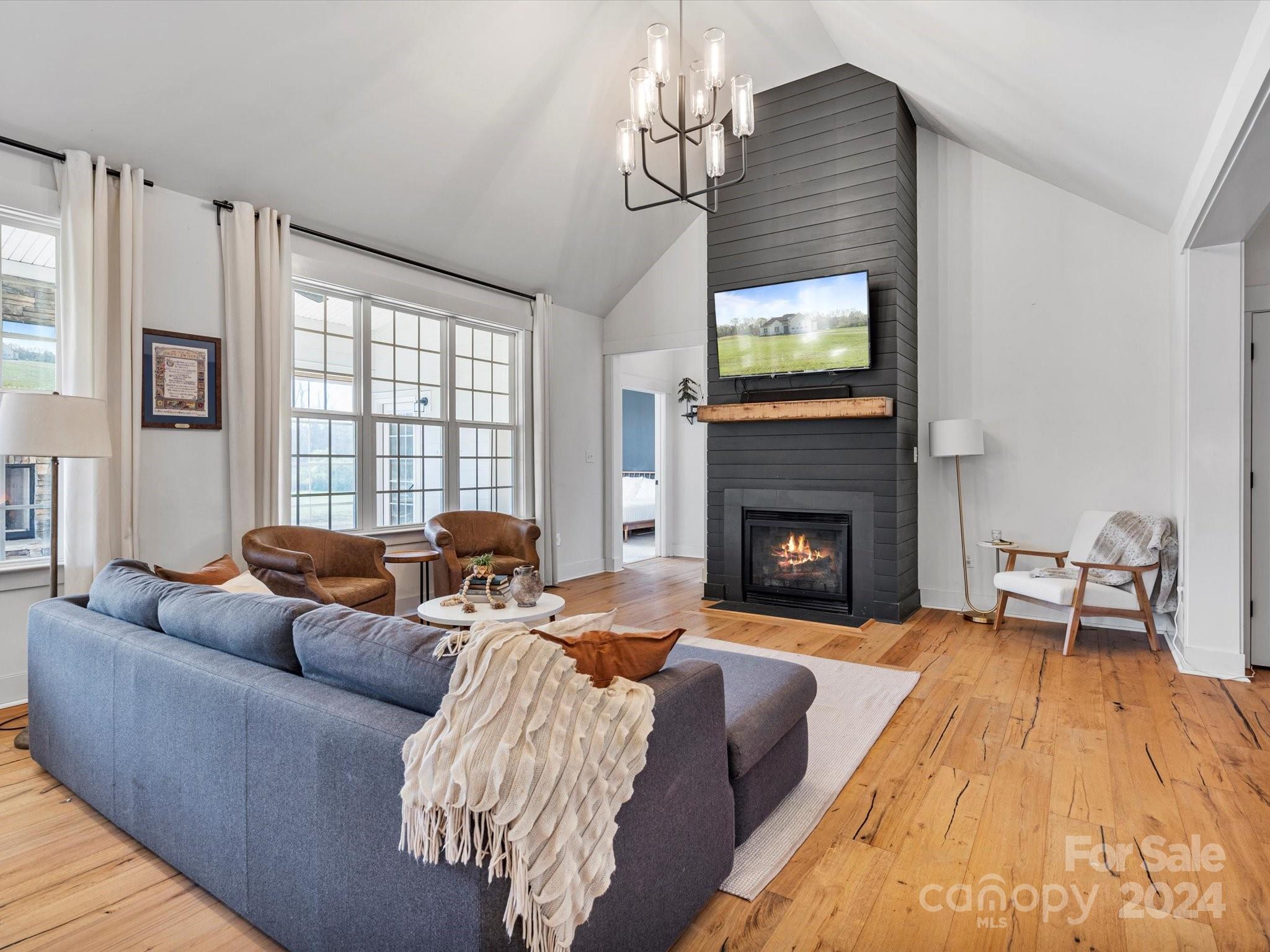 4078 Booney Road Rock Hill, SC 29730 - Photo 9 of 41 a living room with furniture and a fireplace