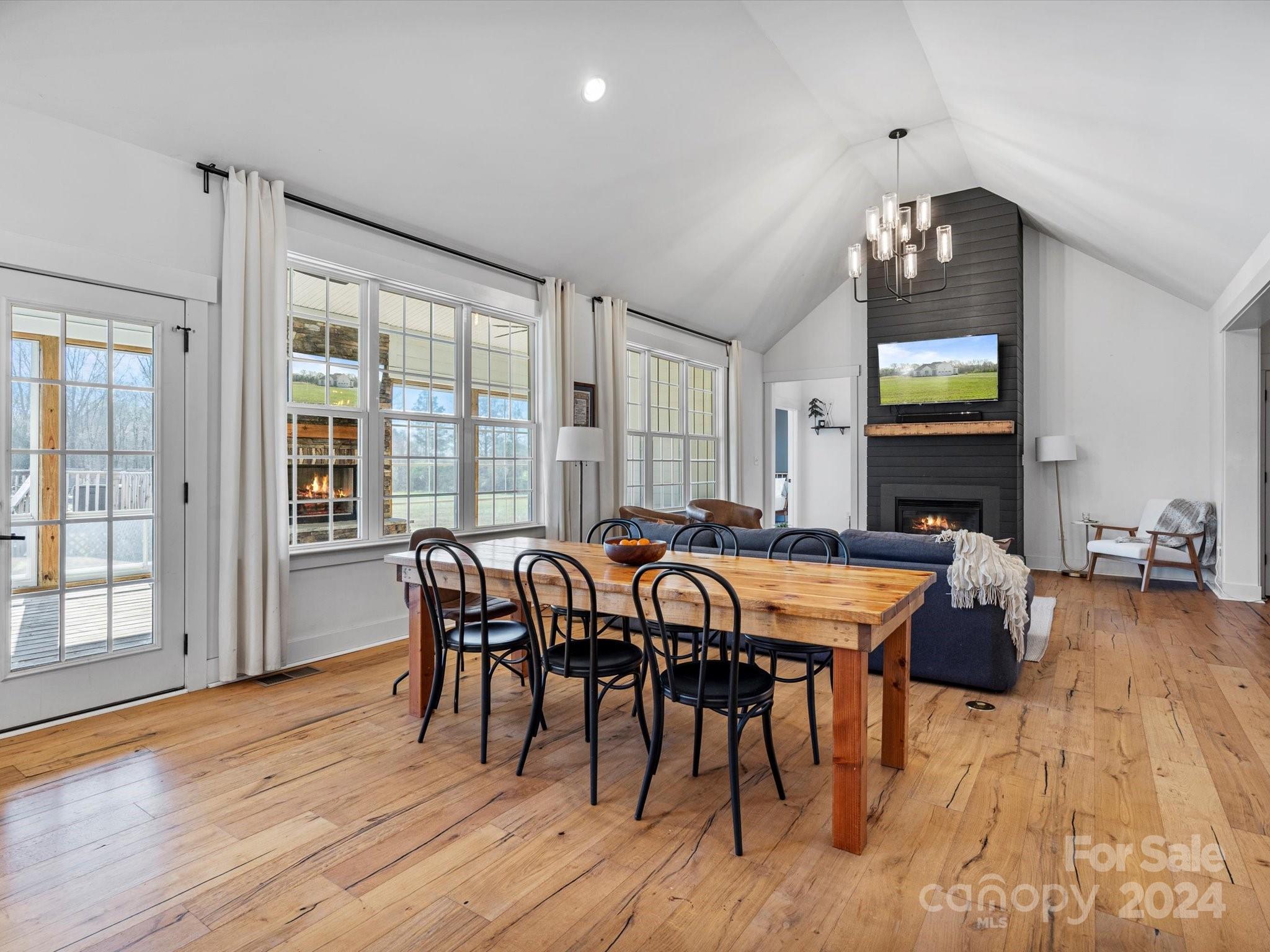 4078 Booney Road Rock Hill, SC 29730 - Photo 10 of 41 a view of a dining room with furniture window and wooden floor