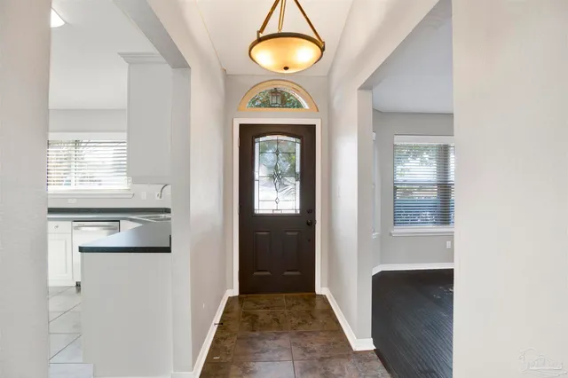 a front view of a house with a porch