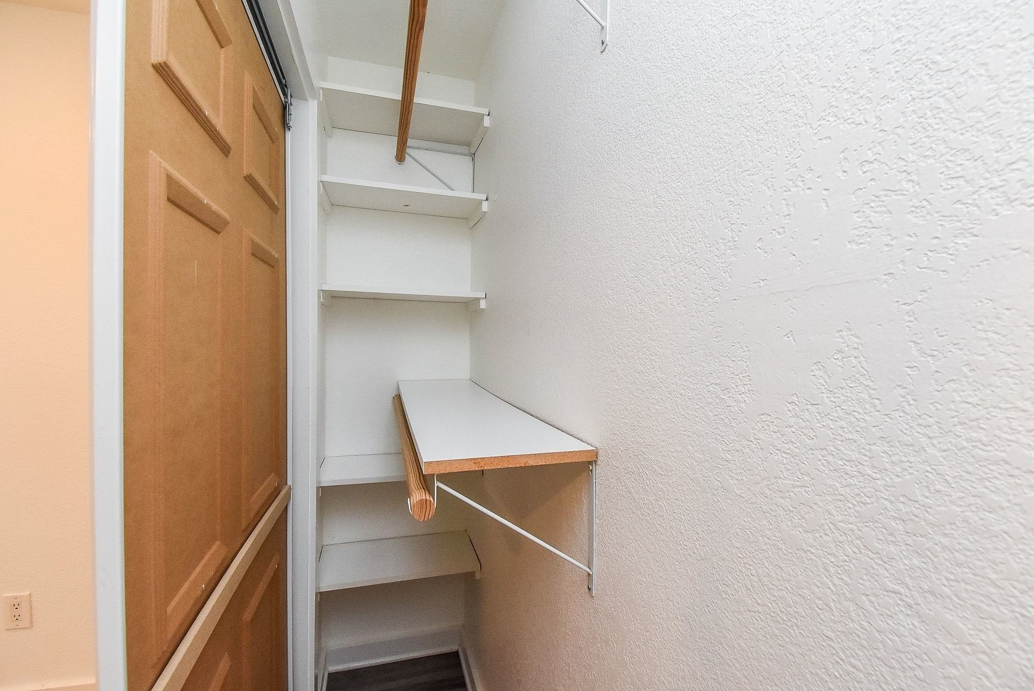 1404 Welch Street, Unit 2 Houston, TX 77006 - Photo 19 of 20 Closet featuring built-in shelving, hanging space, and excellent storage organization.