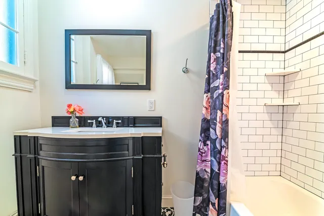 a room with a stove and a sink