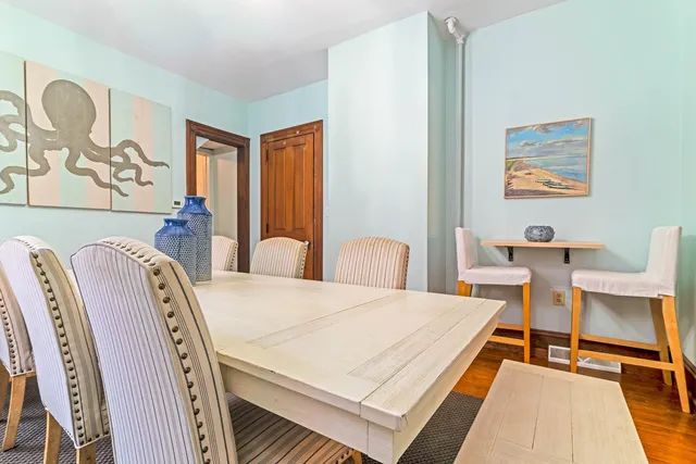 a bedroom with a bed and a table in it