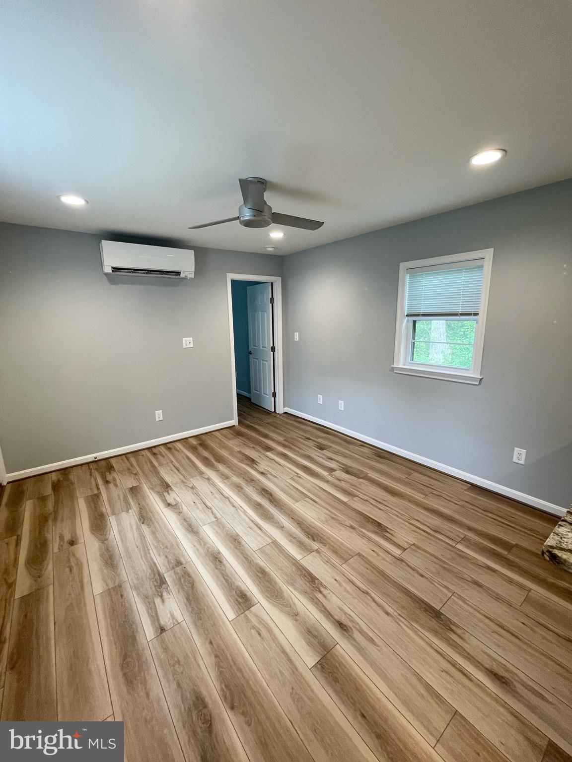 44600 Tall Timbers Road, Unit A Tall Timbers, MD 20690 - Photo 6 of 20 wooden floor in an empty room