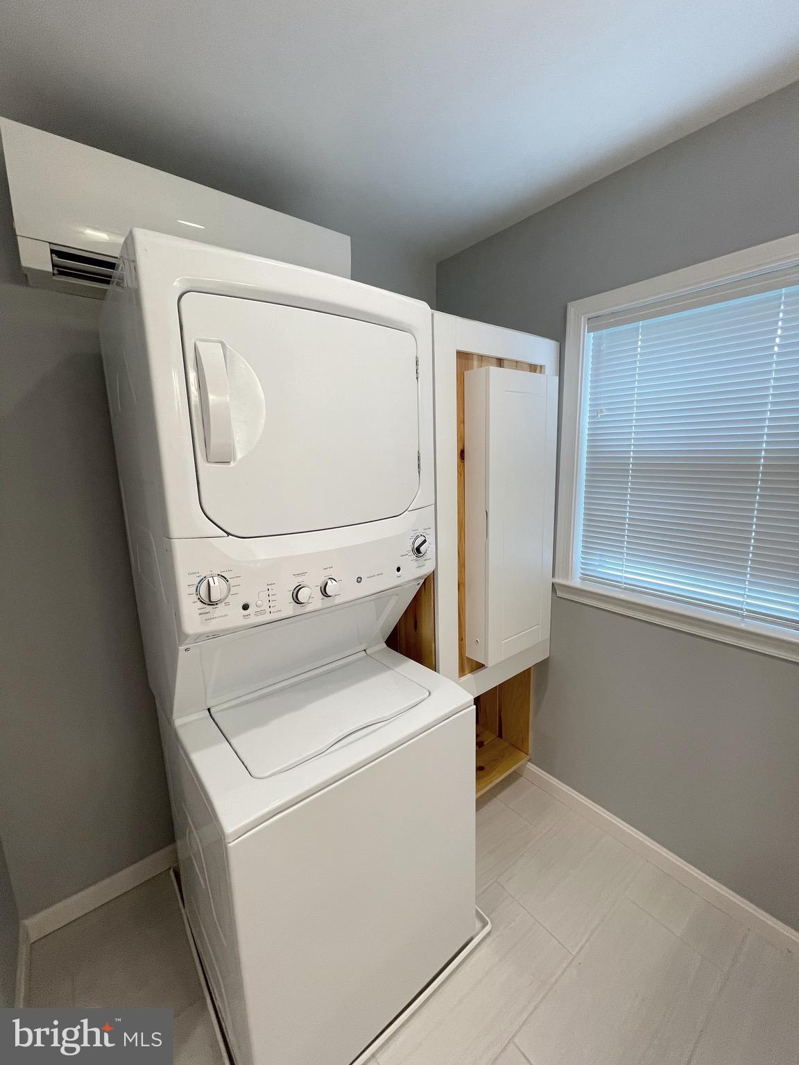 44600 Tall Timbers Road, Unit A Tall Timbers, MD 20690 - Photo 9 of 20 a utility room with dryer and washer