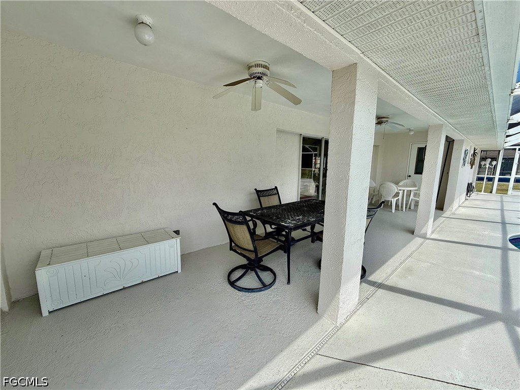 1400 Graham Circle Lehigh Acres, FL 33936 - Photo 11 of 47 a living room with furniture and a rug