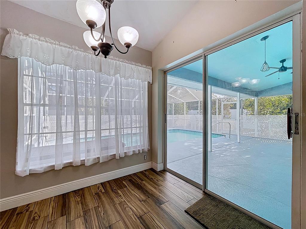 18812 Bascomb Lane Hudson, FL 34667 - Photo 23 of 57 a view of entryway with wooden floor