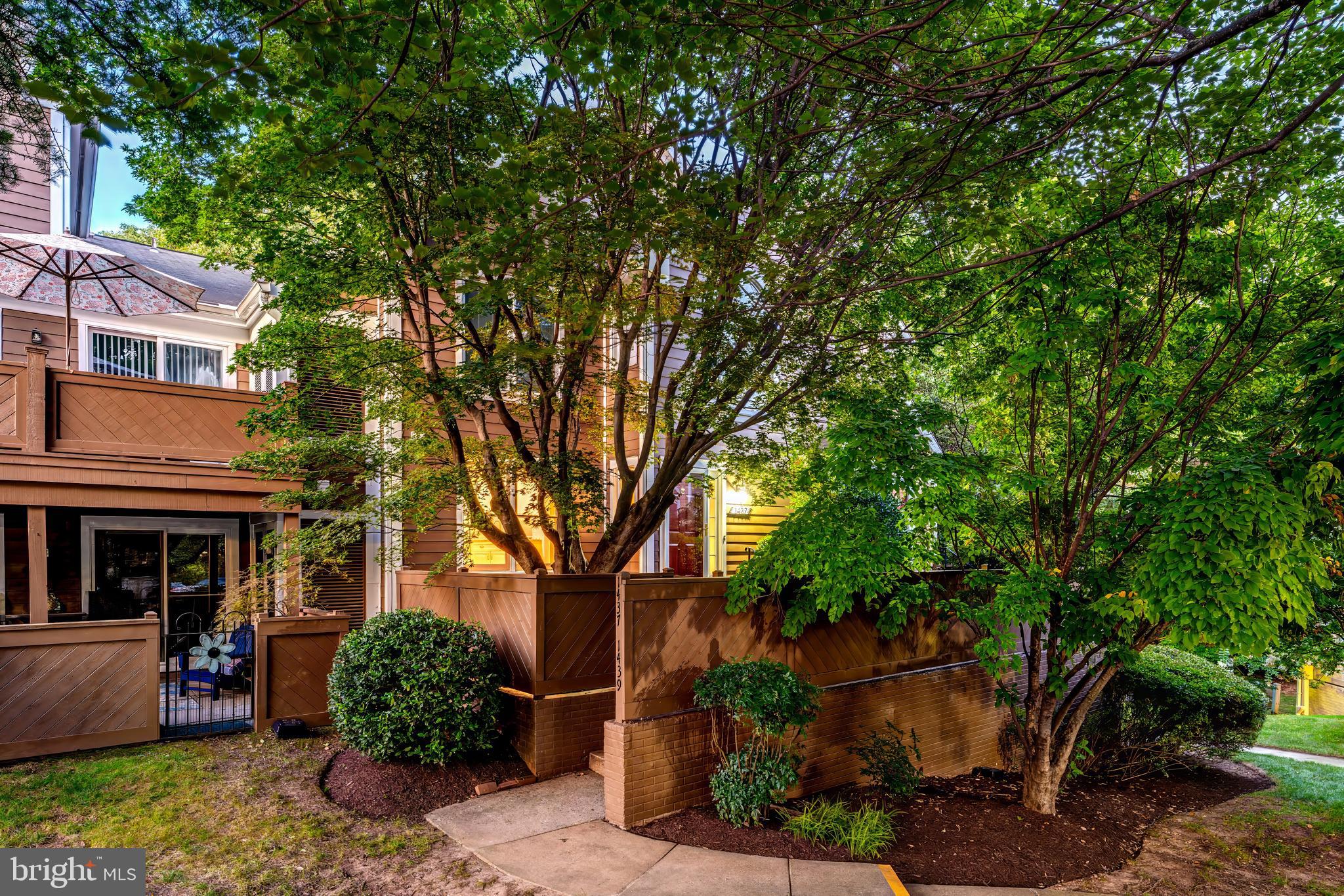 1437 Church Hill Place Reston, VA 20194 - Photo 2 of 6 front view of a house with a tree