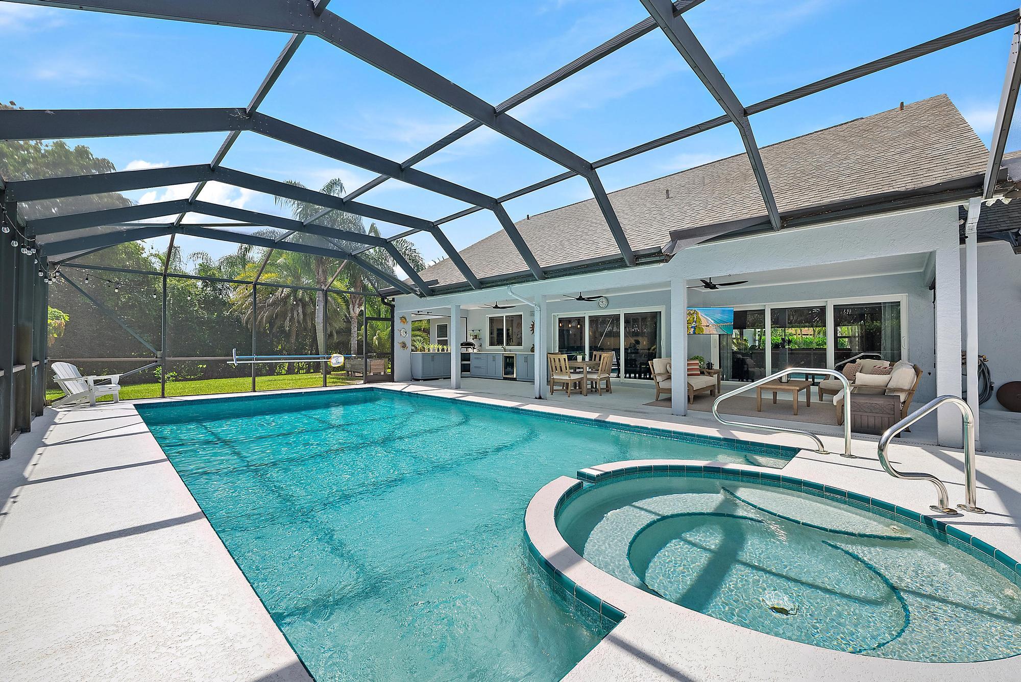 11 Loggerhead Lane Tequesta, FL 33469 - Photo 36 of 46 a view of swimming pool with patio