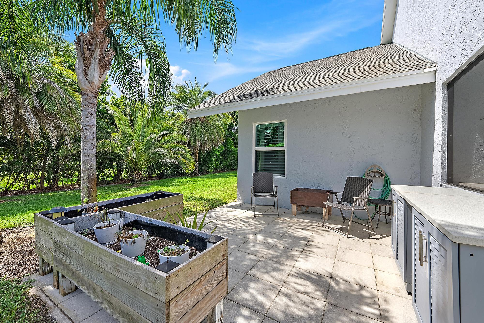 11 Loggerhead Lane Tequesta, FL 33469 - Photo 40 of 46 a view of outdoor space yard and patio