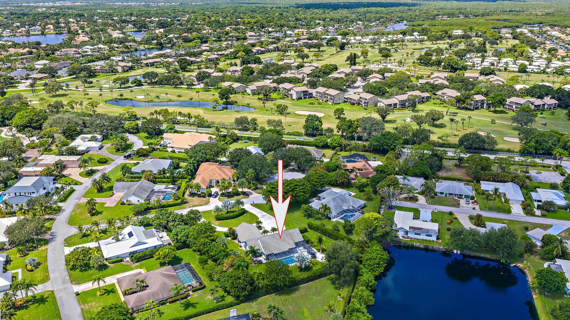 11 Loggerhead Lane Tequesta, FL 33469 - Photo 45 of 46 an aerial view of residential houses with outdoor space and trees