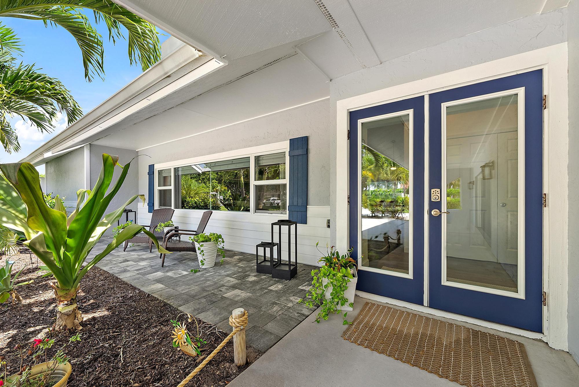 11 Loggerhead Lane Tequesta, FL 33469 - Photo 6 of 46 a view of a house with backyard and sitting area