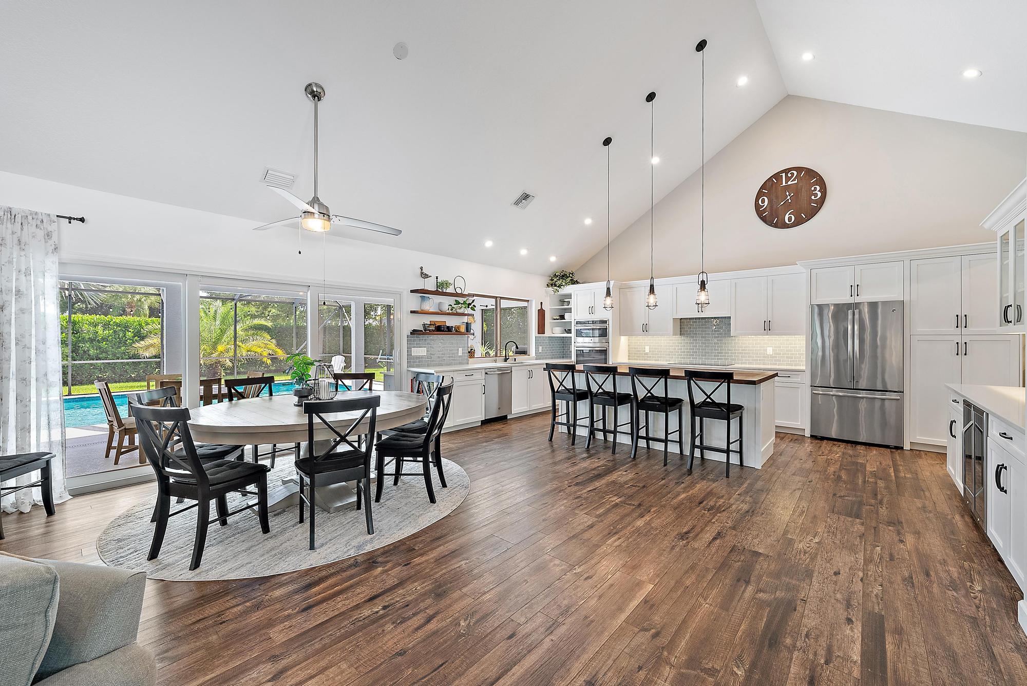 11 Loggerhead Lane Tequesta, FL 33469 - Photo 9 of 46 a view of a dining area with furniture window and wooden floor