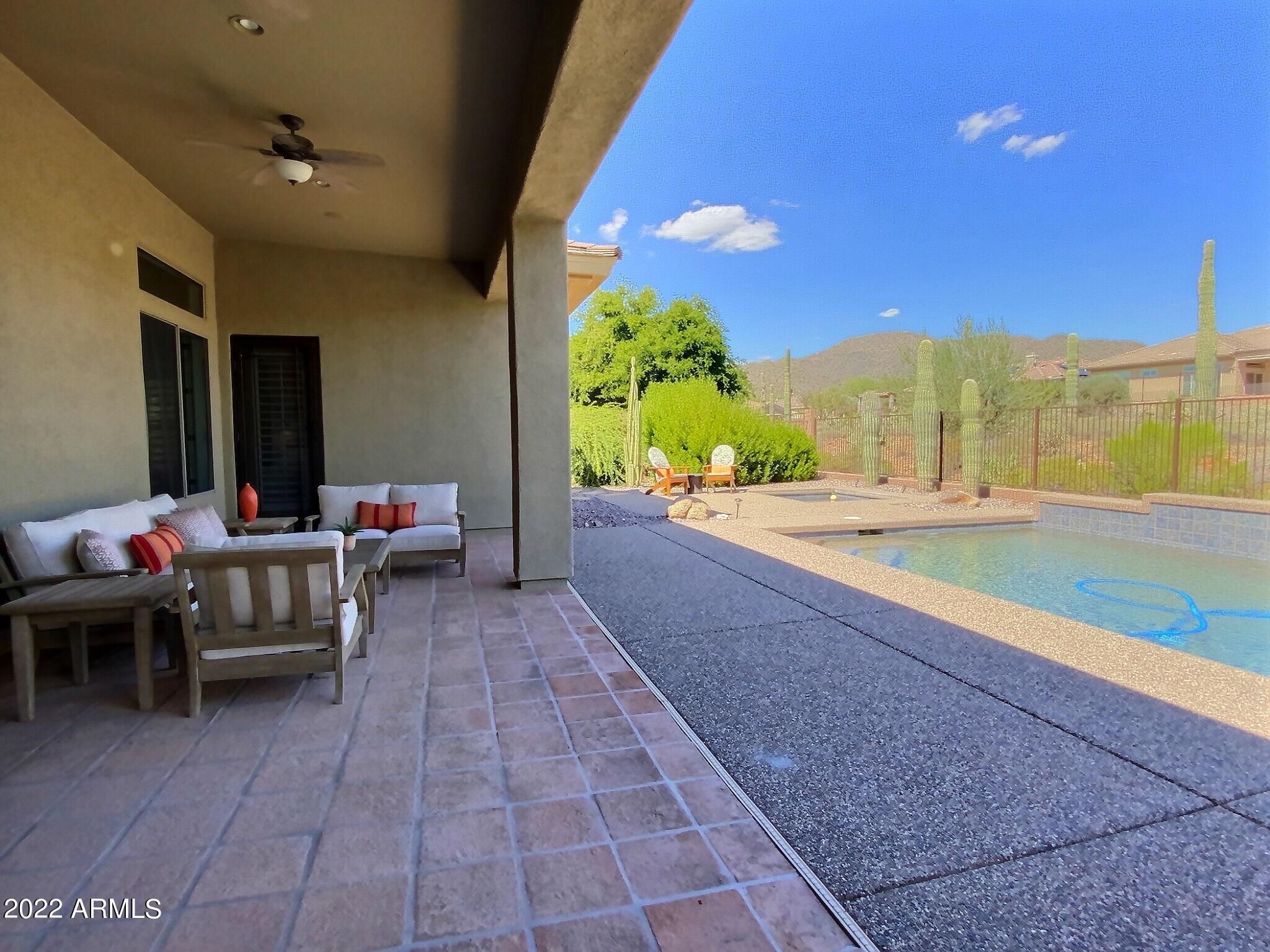 a lobby with furniture and a potted plant