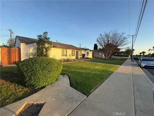 a view of a house with a garden