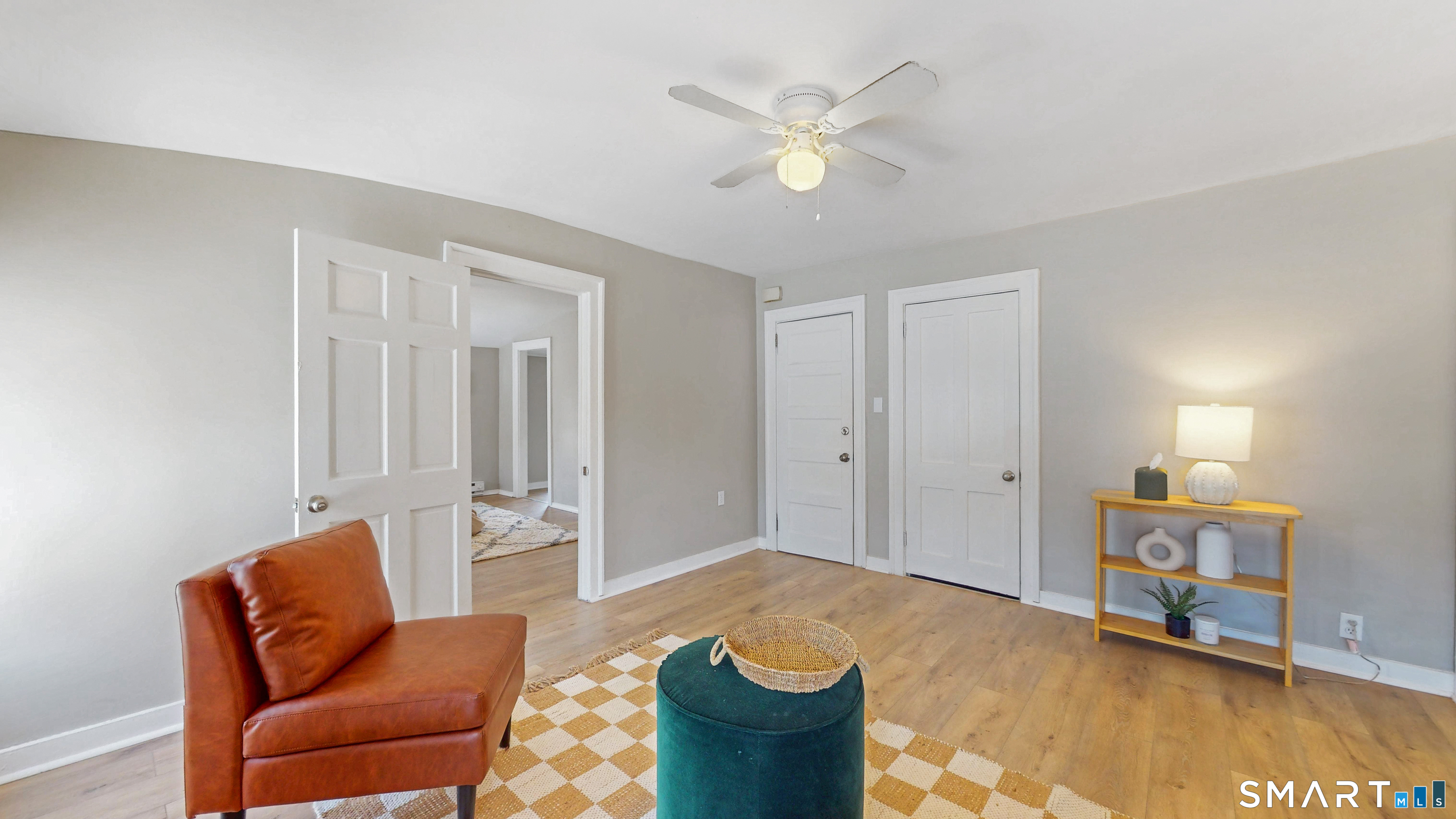 24 Madison Street Hartford, CT 06106 - Photo 12 of 18 a living room with furniture and a rug