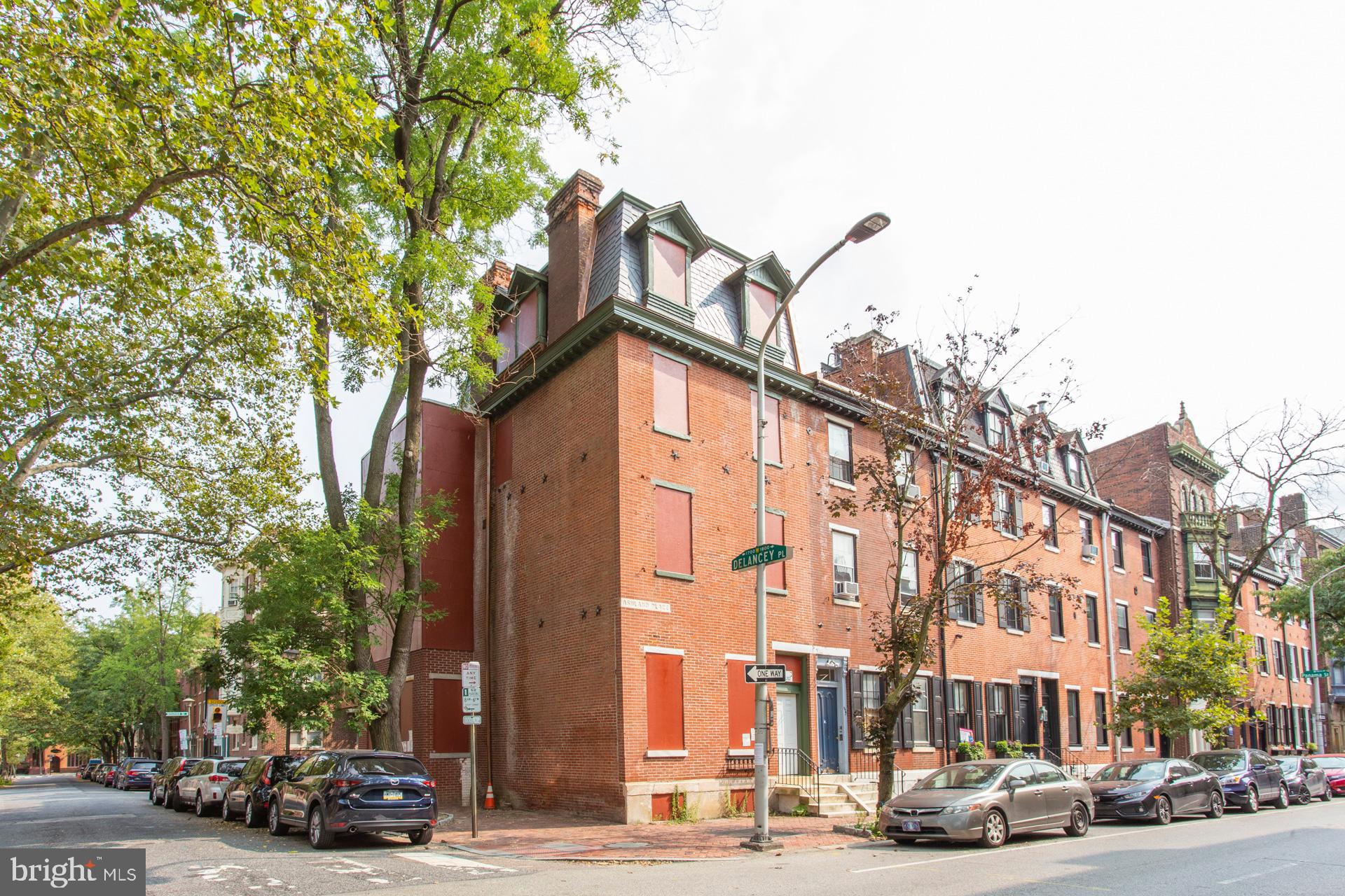 325 South 18th Street Philadelphia, PA 19103 - Photo 2 of 16 a view of a building and car parked on the roadside