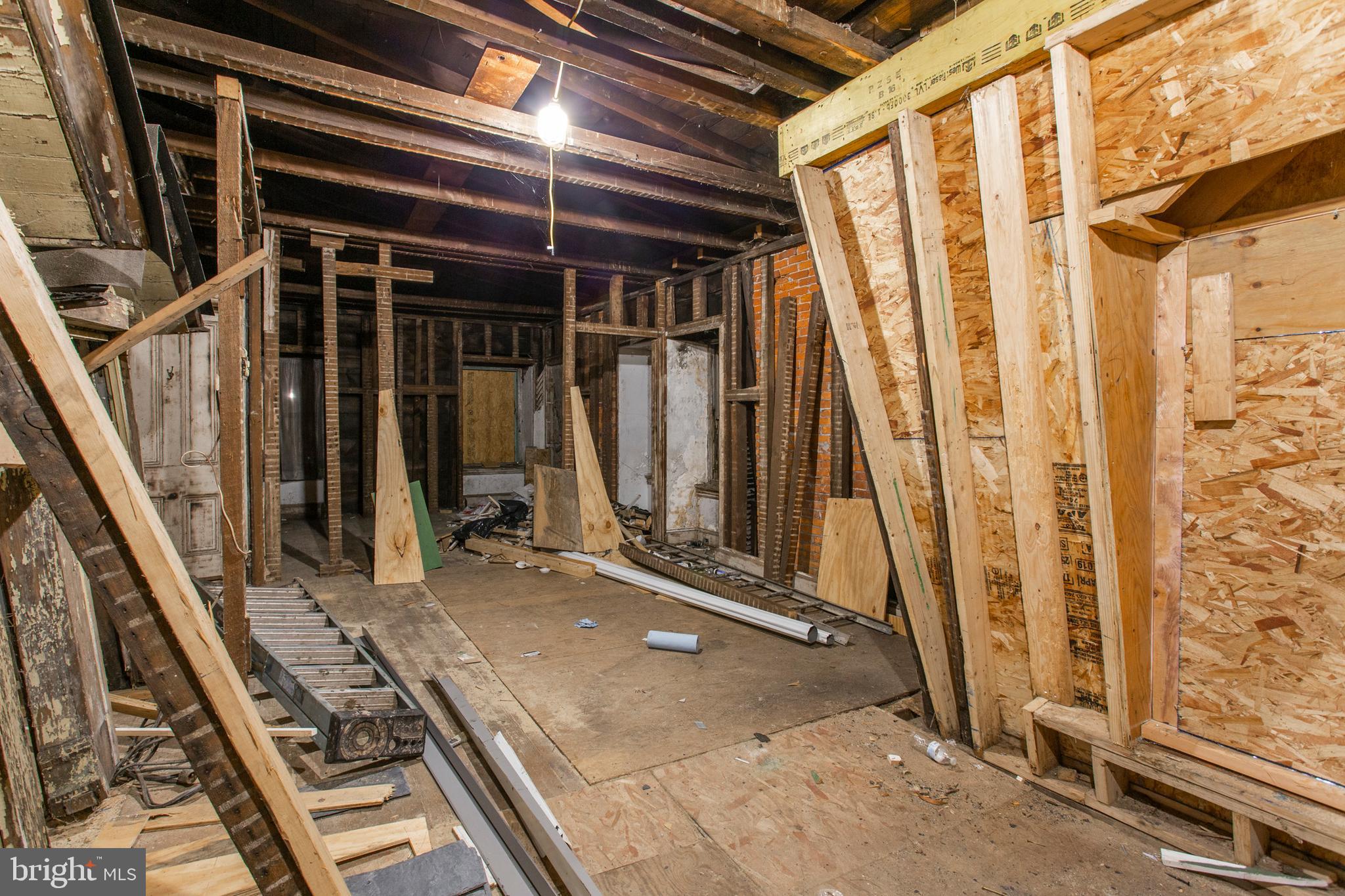 325 South 18th Street Philadelphia, PA 19103 - Photo 14 of 16 a view of a room with wooden floor and windows