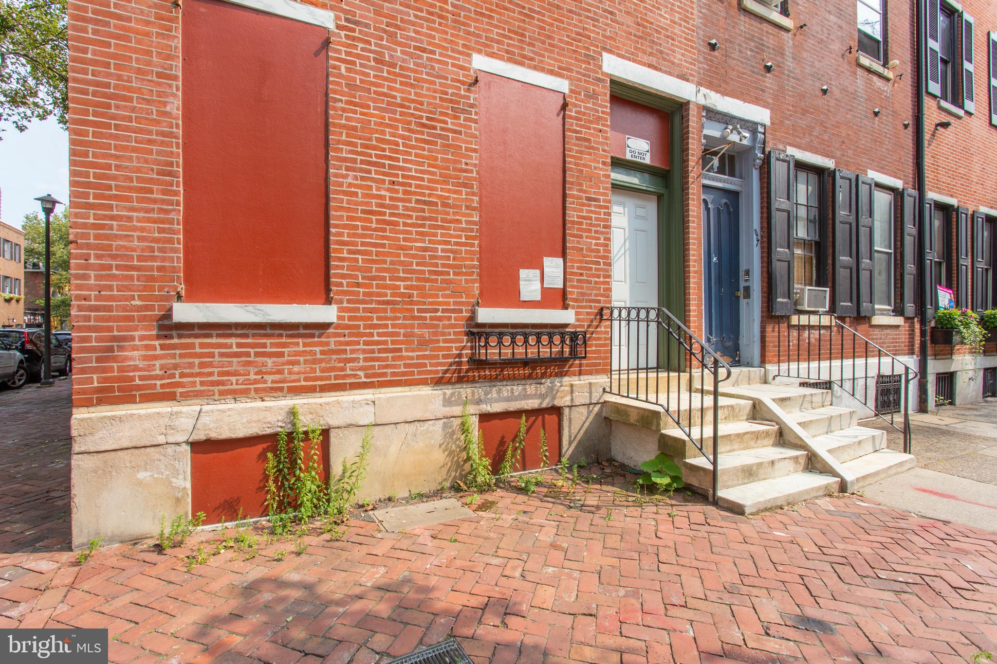 325 South 18th Street Philadelphia, PA 19103 - Photo 16 of 16 a view of a brick building with a bench in front of house
