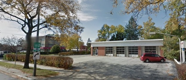 1148 Waukegan Road Glenview, IL 60025 - Photo 2 of 2 a view of a house with a yard and garage