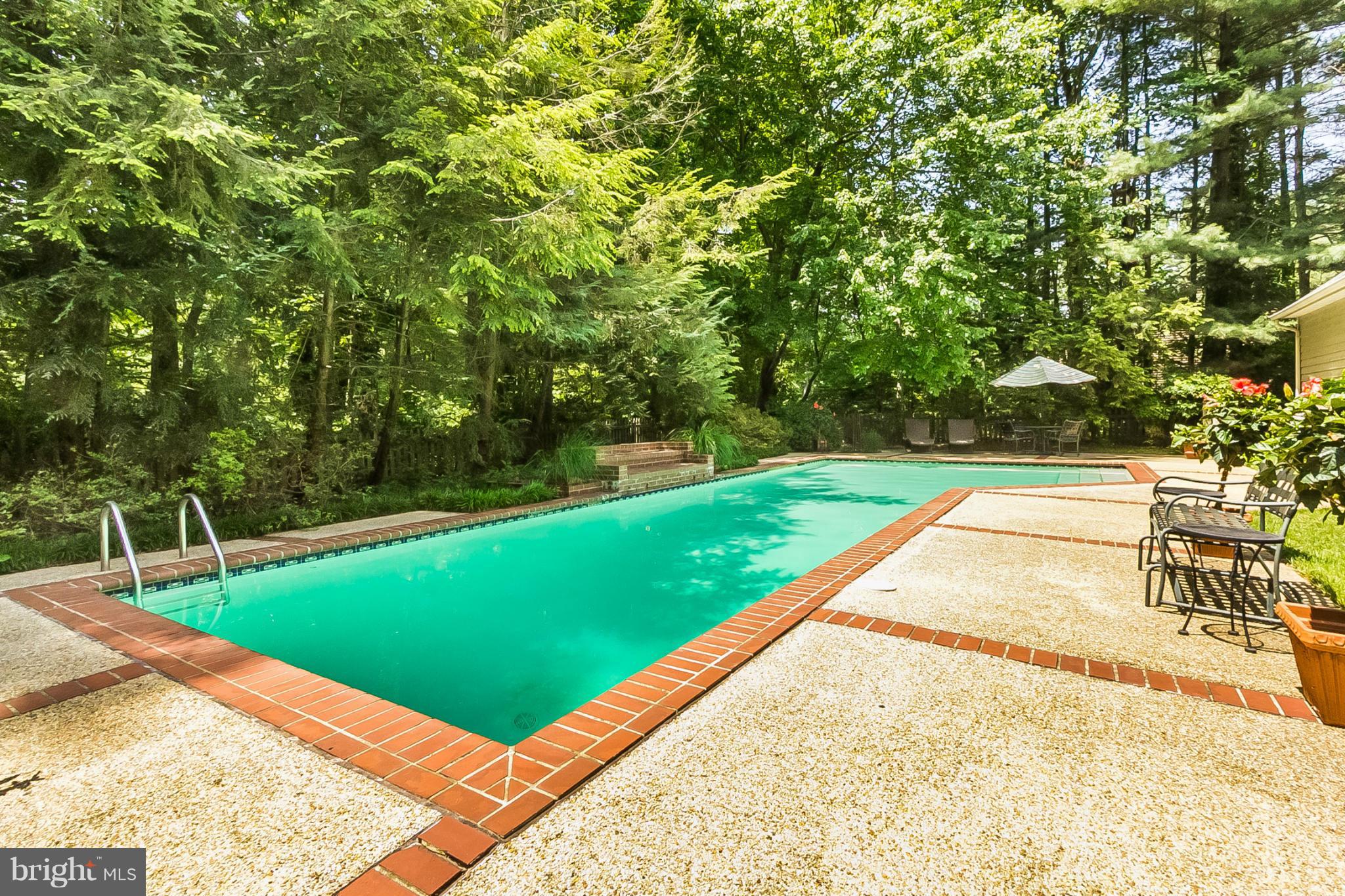25 Shadow Point Court Edgewater, MD 21037 - Photo 10 of 28 Heated swimming pool with waterfall