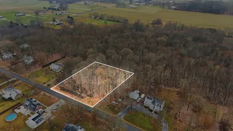 a view of roof with wooden floor