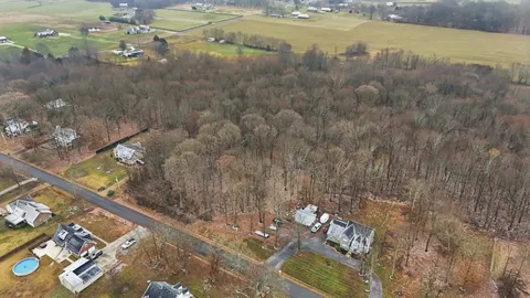 a view of residential houses with outdoor space