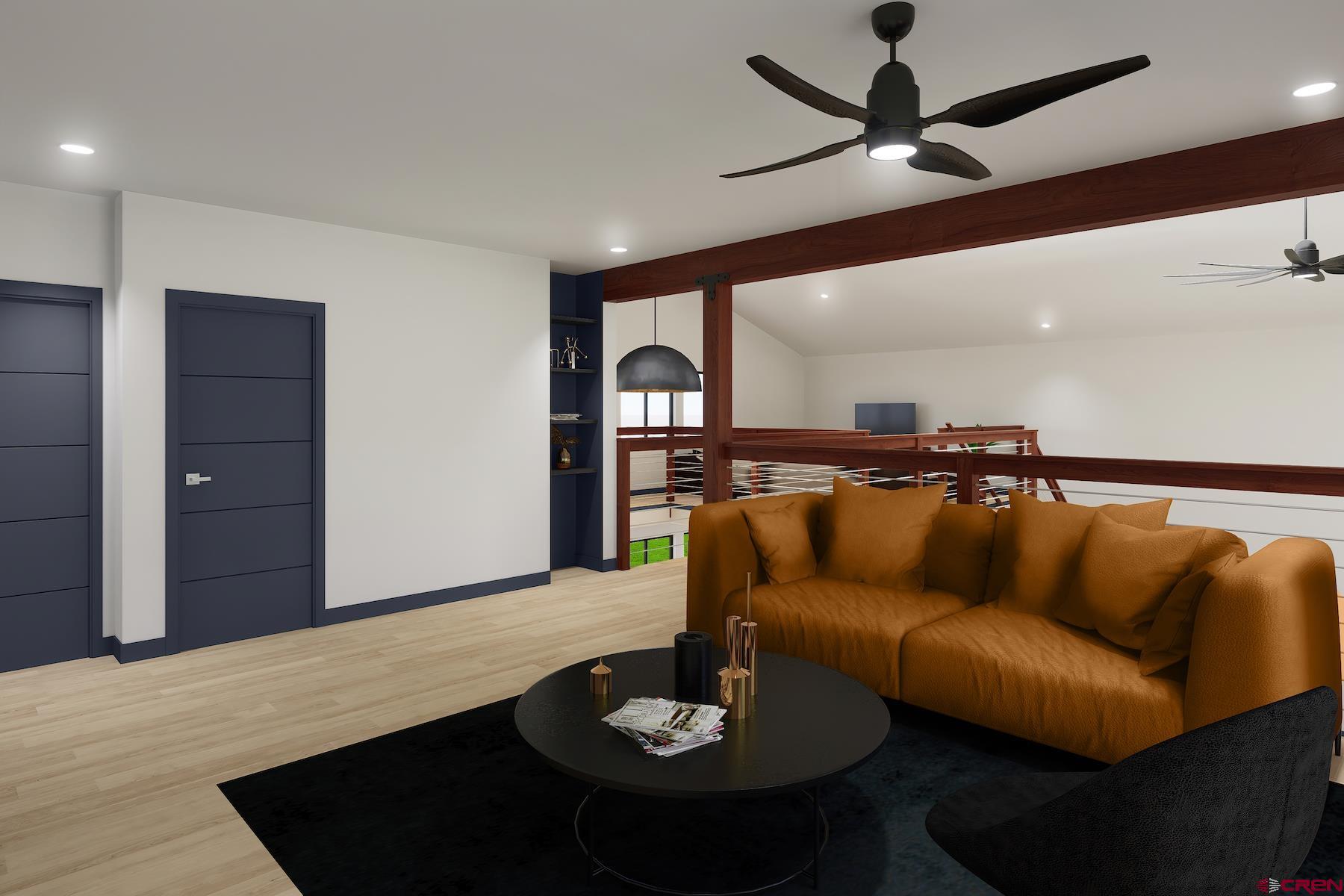 192 Rawhide Road Durango, CO 81303 - Photo 28 of 41 a living room with furniture and a wooden floor