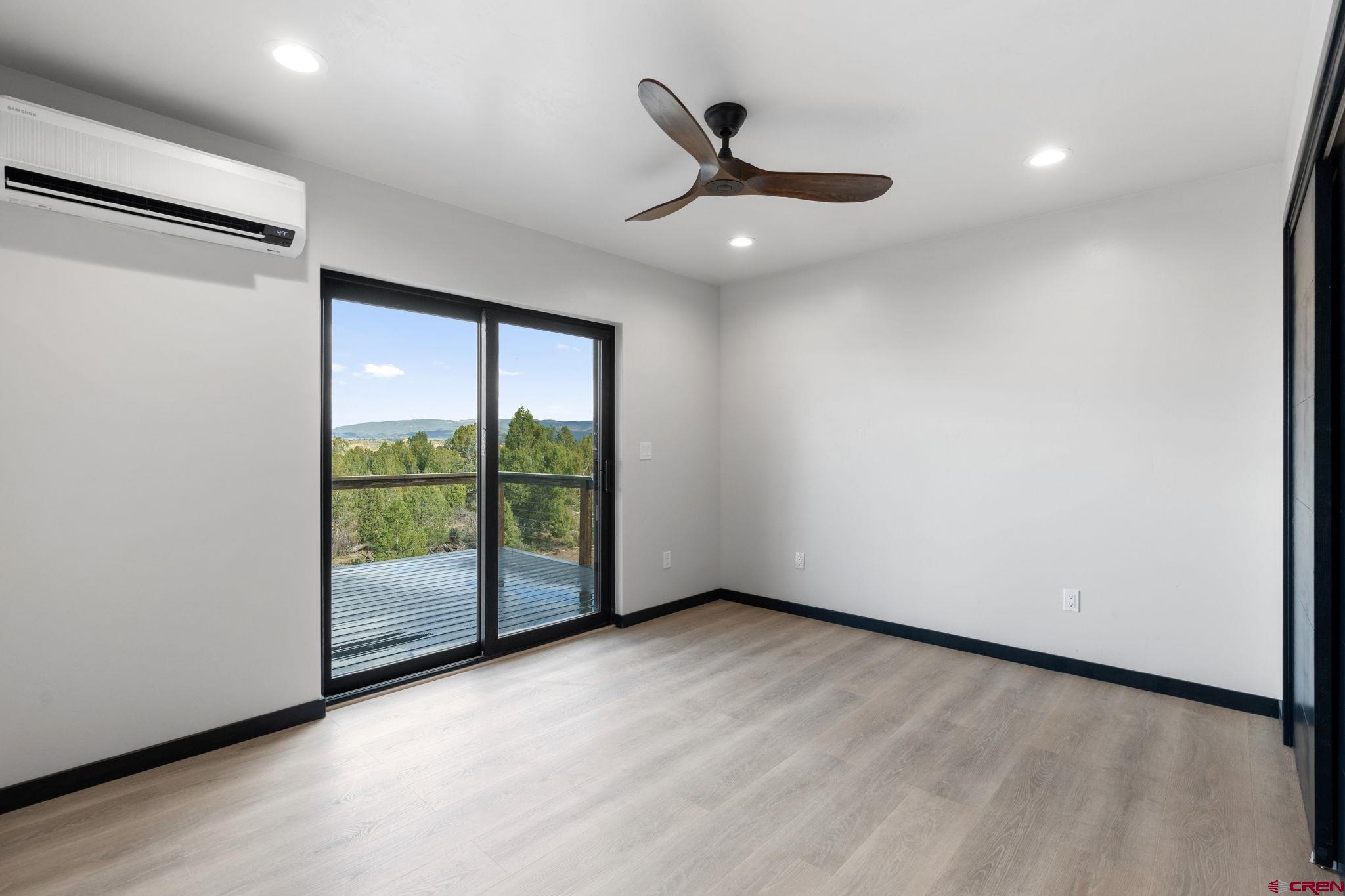 192 Rawhide Road Durango, CO 81303 - Photo 32 of 41 a view of an empty room with a window