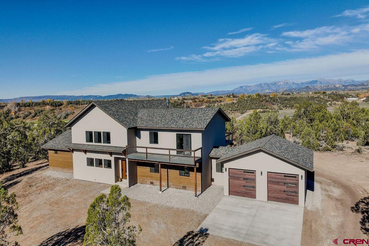 192 Rawhide Road Durango, CO 81303 - Photo 40 of 41 an aerial view of residential houses with city view
