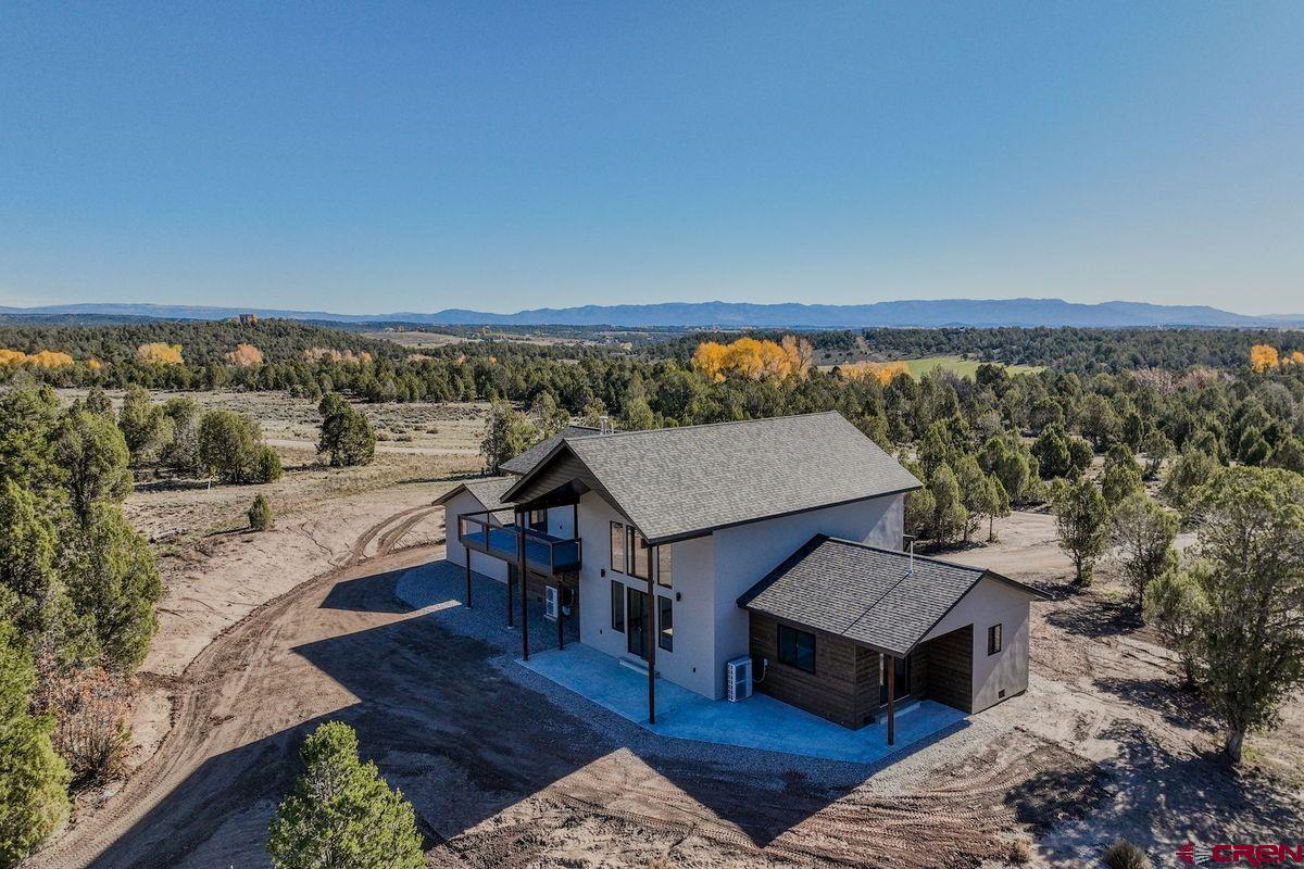 192 Rawhide Road Durango, CO 81303 - Photo 41 of 41 a terrace of a house with outdoor seating